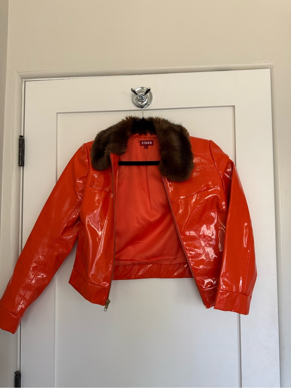 STAUD Bright Orange Patent Bomber with Brown Fur Collar